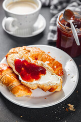 Croissant with jam French toast fresh tasty food dish Delicious gourmet food background on the table rustic food top view copy space