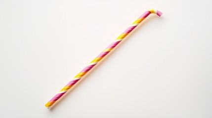  a pink and yellow candy cane on a white background The candy cane is in the center of the image, with the white background providing a stark contrast to the vibran
