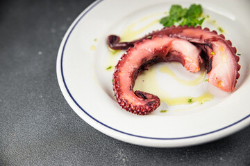 Octopus food seafood octopus tentacles fresh tasty food dish pescetarianism delicious gourmet food background on the table rustic food top view copy space keto and paleo diet