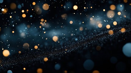 Obraz premium Abstract image featuring a dreamy bokeh effect with various sized orange and blue lights on a dark background