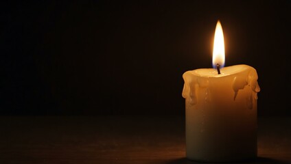 Candle flame symbolizing hope and spirituality.