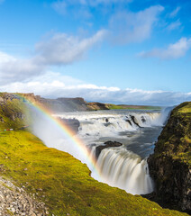 The Gullfoss waterfall on iceland as part of the Golden Circle, with long exposure for smooth water and rainbow