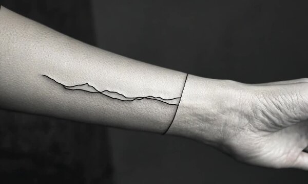 Minimalistic Line Tattoo Art on Arm in Monochrome Black and White Photography Style