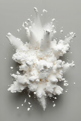 A cloud of white powder is flying through the air