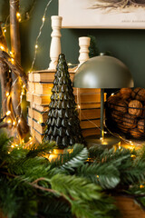 New Year's decor on the fireplace. Christmas decor