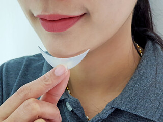 Silicone chin implant, Women tested before chin augmentation surgery, Facial Implants by doctors at...
