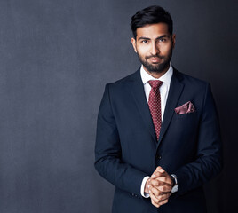 Portrait, businessman and pride for career with fashion, formal clothes and style on gray background. Male person, mockup space and elegant with jacket, tie and confidence with smile as entrepreneur