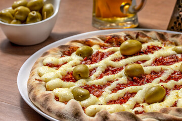 Olive pizza with cream cheese