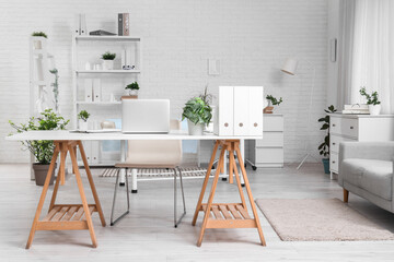 Doctor's workplace with laptop in medical office
