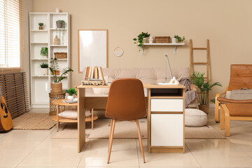 Interior of stylish living room with workplace, sofa and shelf unit