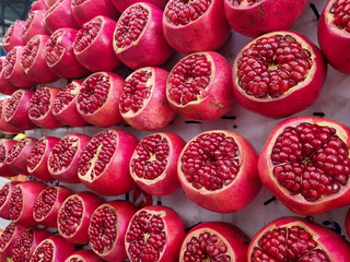 Ripe pomegranate. Fresh juicy pomegranate on a market