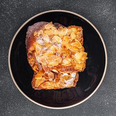 Brioche sweet almond french toast fresh tasty food dish delicious gourmet food background on the table rustic food top view copy space