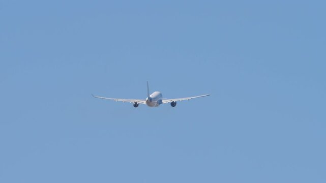NOVOSIBIRSK, RUSSIAN FEDERATION - APRIL 27, 2024: Airbus A330 of I-Fly take off. Passenger plane departure. Travel concept. Airplane rising into the sky, landing gear retracting