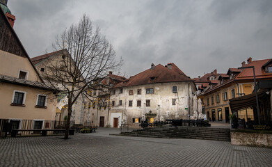 Gornji trg square embraces the charm of skofja loka in winter's embrace