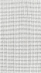 Close-up of canvas texture with visible weave pattern, weave