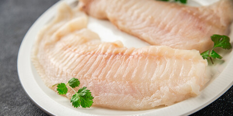 Raw fish fillet fresh tasty food dish delicious gourmet food background on the table rustic food top view copy space keto and paleo diet pescetarian