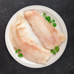 Raw fish fillet fresh tasty food dish delicious gourmet food background on the table rustic food top view copy space keto and paleo diet pescetarian