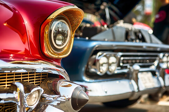 Fototapeta Vintage American cars on exhibition at summer cruise-in.