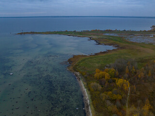 Aerial photo taken over Paljassaare Peninsula in Tallinn, Estonia, captures the land covered in...