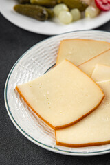 Raclette cheese tasty food dish fresh delicious gourmet food background on the table rustic food top view copy space top view