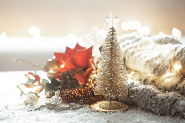 Christmas background with details of festive decor on a blurred background.