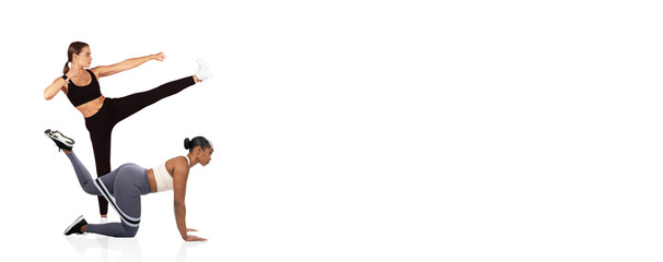 Two women are engaged in a fitness training session, showcasing dynamic exercises. One performs a high kick while the other is on all fours, demonstrating strength and coordination.