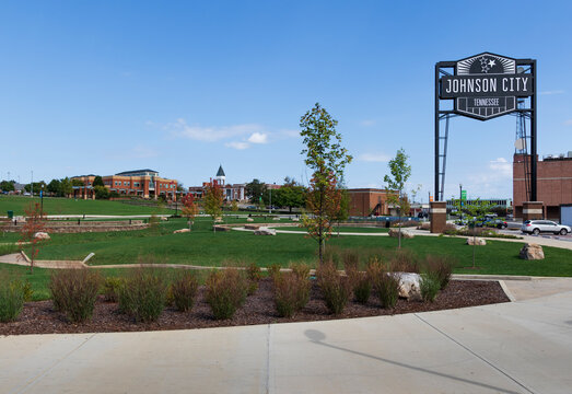 JOHNSON CITY, TN, USA-9/30/18: An open grassy park called "King Commons",, featuring the large "Johnson City" steel sign.