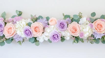 Obraz premium Elegant floral arrangement with pastel roses and eucalyptus leaves showcases fresh beauty for any occasion