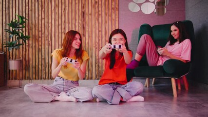 A lively group of friends comes together in a cozy living room space, enjoying a variety of video games that fill the air with warmth, joy, laughter, and playful banter for everyone present