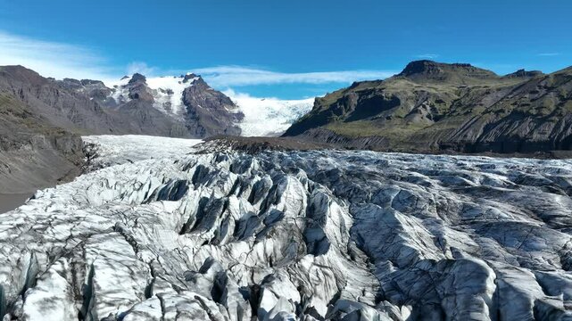 Aerial video of Vatnajokull glacier on iceland with interesting texture and ridges