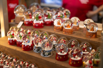 Christmas decorations close-up. Glass toys at the Christmas market