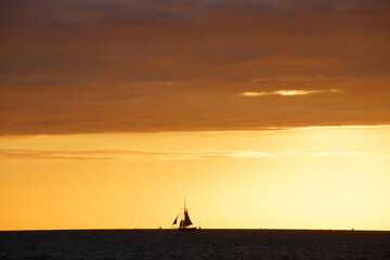 Colorful sunset sky in summer over the Atlantic Ocean in Saint Malo bay , Brittany, France.