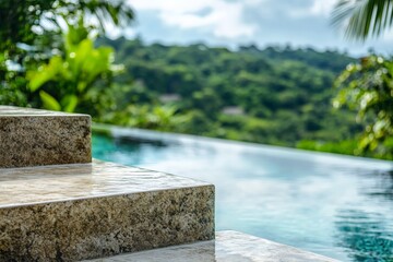 An infinity pool appears to merge with the lush hilly backdrop, its surface reflecting the cloudy sky, providing a seamless blend of nature and luxury.