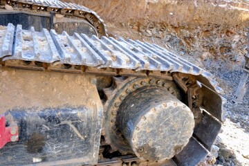 Close-up and general views of construction machines on a construction site. Excavator, drilling...