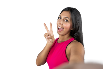 Smiling Mexican Woman Taking a Selfie in Studio with White Background. Concept of Happiness