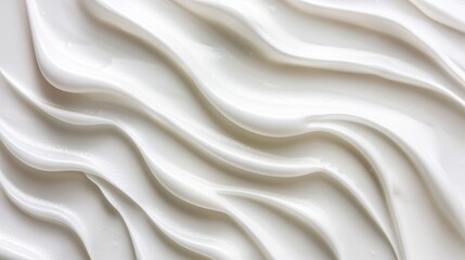 Fototapeta premium Cream moisturiser close-up with wavy texture on white background - skincare beauty product.