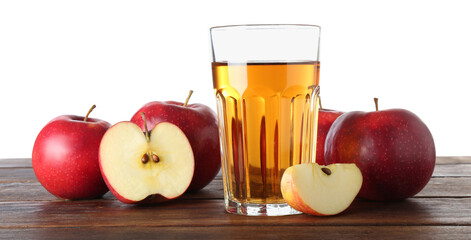Tasty apple juice in glass and fresh fruits on wooden table against white background