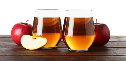 Tasty apple juice in glasses and fresh fruits on wooden table against white background