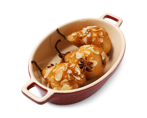 Delicious pears with caramel sauce, almond flakes and anise stars isolated on white