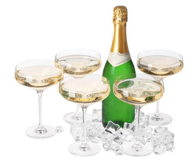 Bottle and glasses of champagne with ice cubes isolated on white
