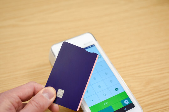 Making a card payment on a contactless pdq machine with a credit or debit card