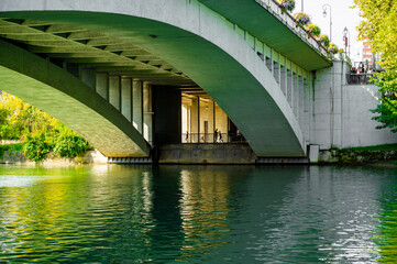 Paris, France. View under the Joinville Bridge over the Marne River in Paris. People doing fitness exercises under the bridge.