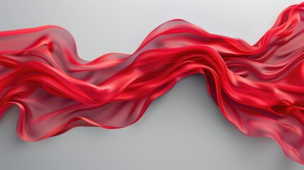 Flowing red fabric on gray background with elegant texture.