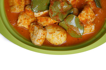Eggs and tofu balado with spices and lime leaves. Indonesian cuisine. Focus selected