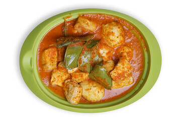 Eggs and tofu balado with spices and lime leaves. Indonesian cuisine. Focus selected
