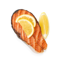Tasty grilled salmon steak with lemon isolated on white, top view