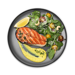 Tasty grilled salmon steak with lemon, sauce and salad isolated on white, top view