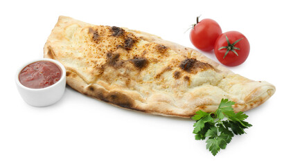 Delicious calzone with fresh parsley, tomatoes and ketchup isolated on white