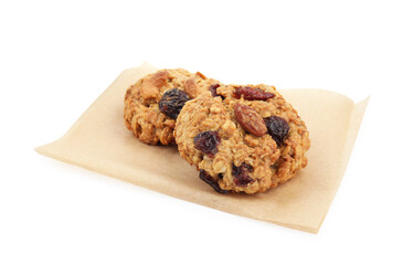 Delicious oatmeal cookies with dried cranberries and nuts isolated on white
