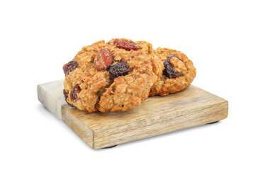 Delicious oatmeal cookies with dried cranberries and nuts isolated on white